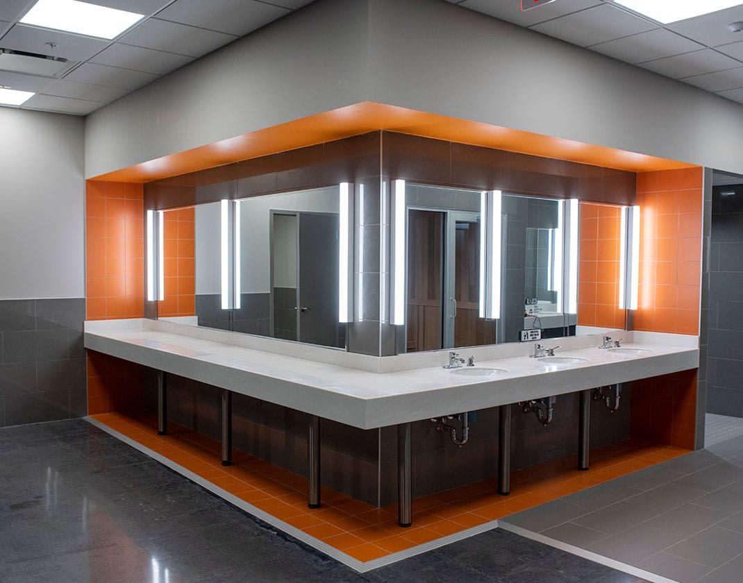 modern vanity in spacious locker room