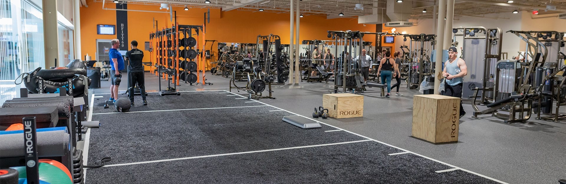 clean weights and weight room in modern gym near me
