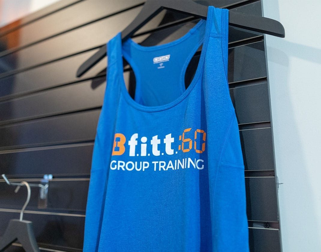 blue tshirt hanging up at best fitness store
