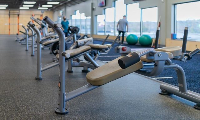 free weights floor at modern gym