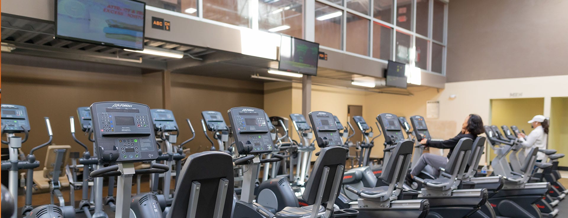 cardio machines at modern gym