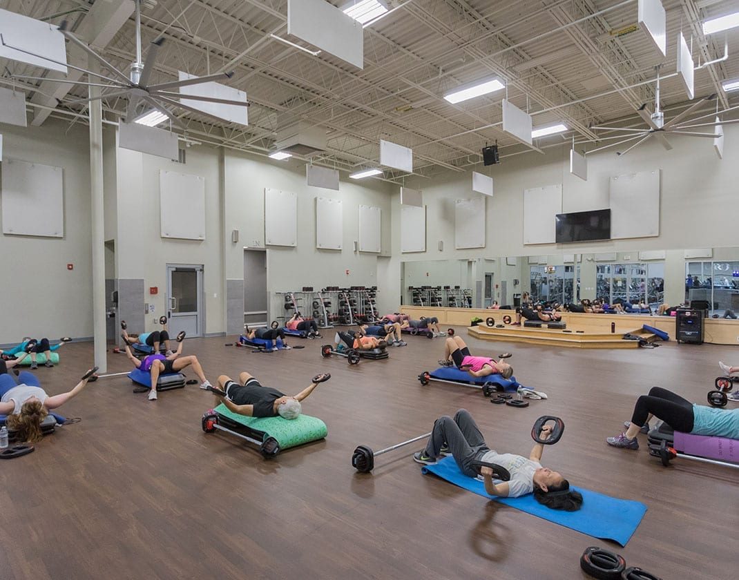 group exercise class in spacious fitness studio
