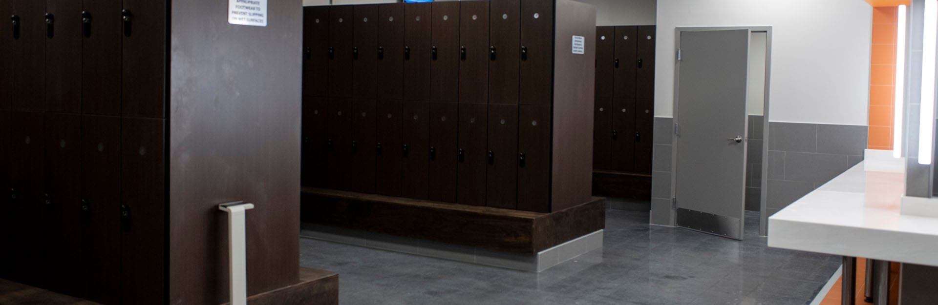 spacious locker room at modern gym