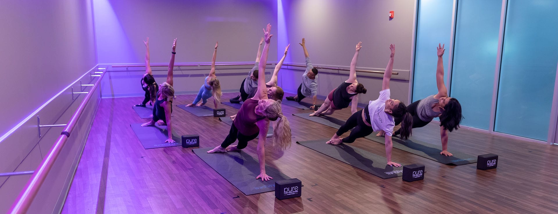 yoga class in session at yoga studio