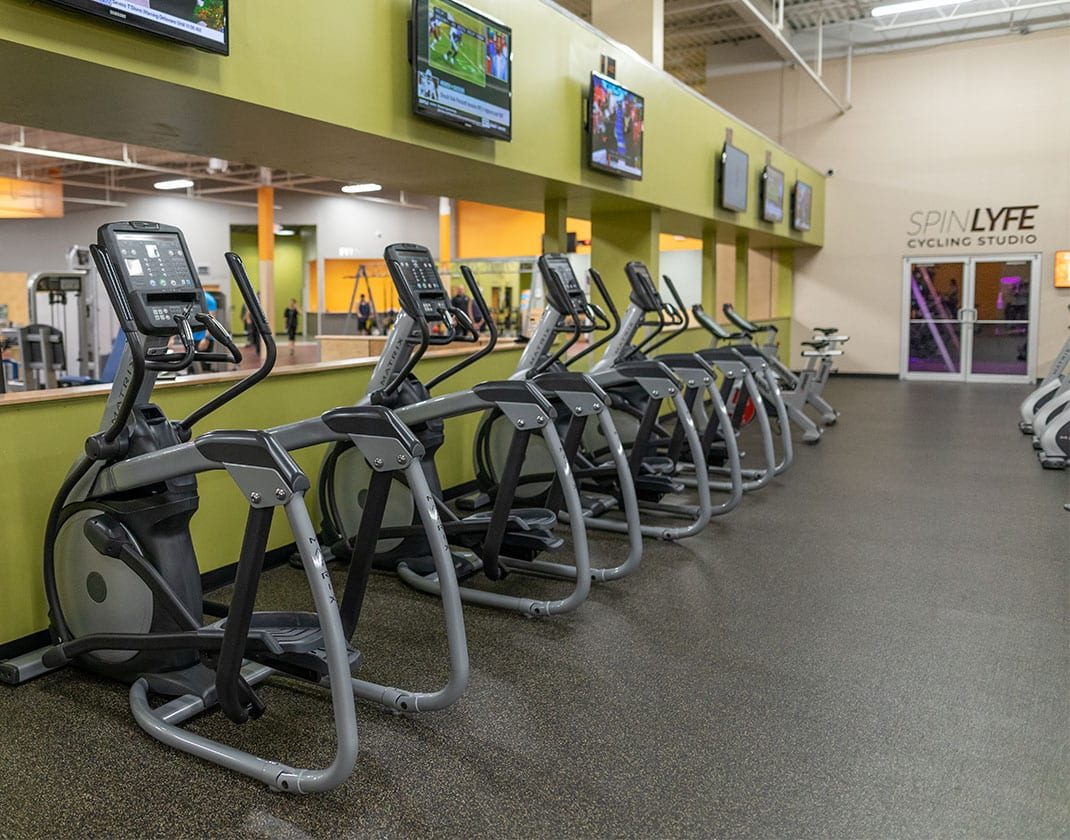 ellipticals in spacious gym floor