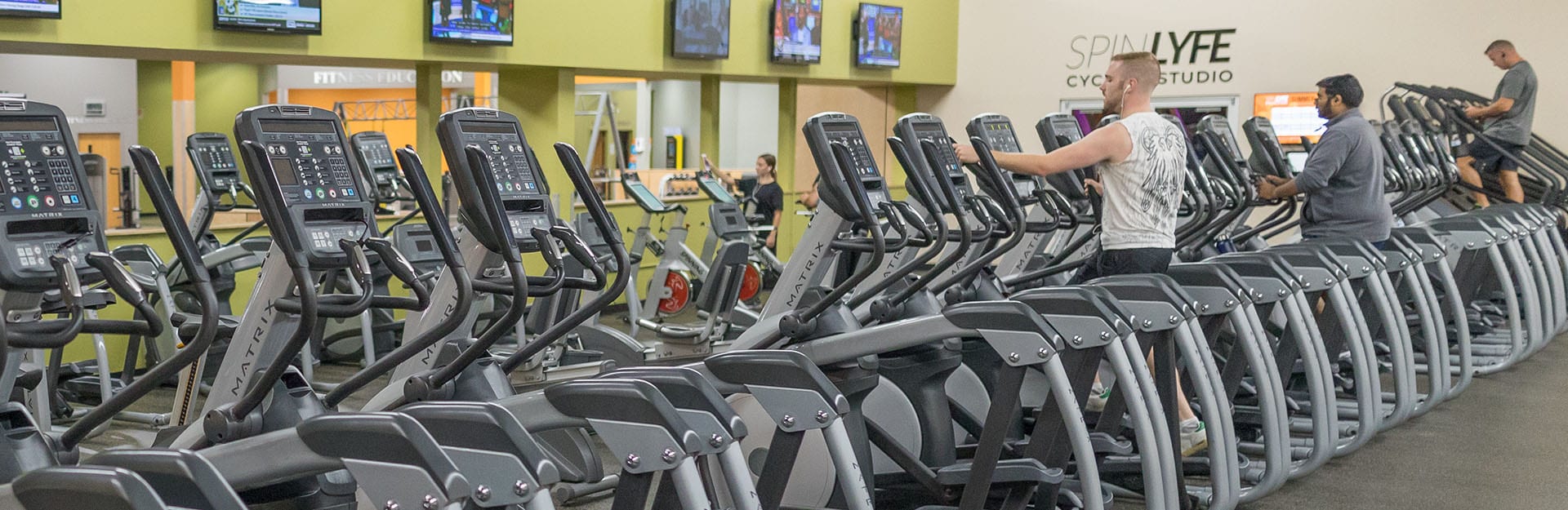 cardio machines on spacious gym floor