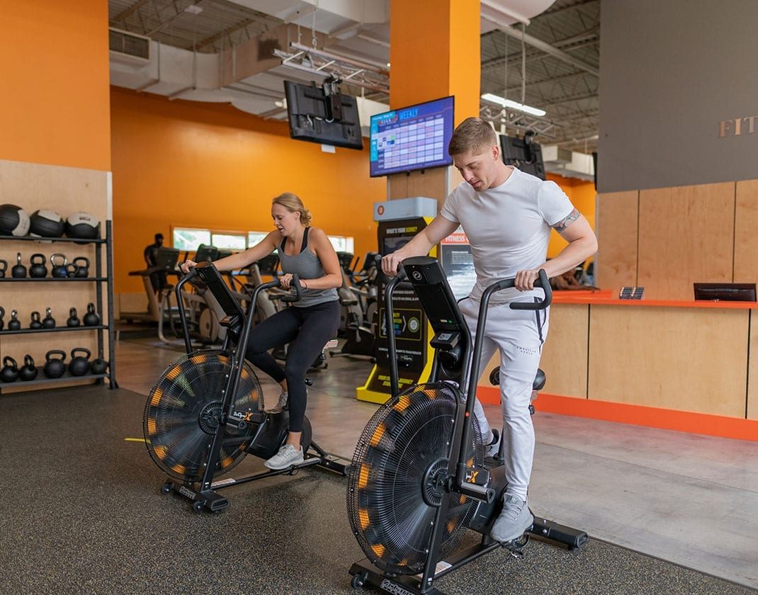 gym members using functional training bikes