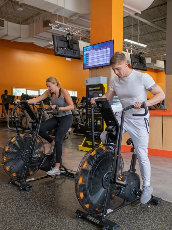 gym member use air bikes for cardio training at a gym near me in springfield