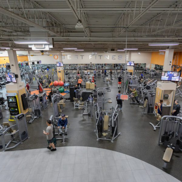 an aerial view of a spacious weight room at a woburn gym