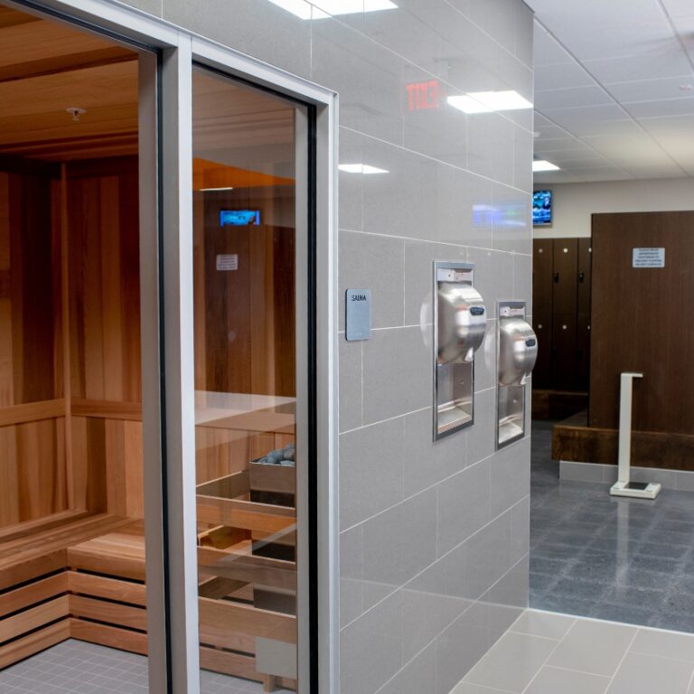 spacious and clean locker room and sauna at a best fitness gym in woburn